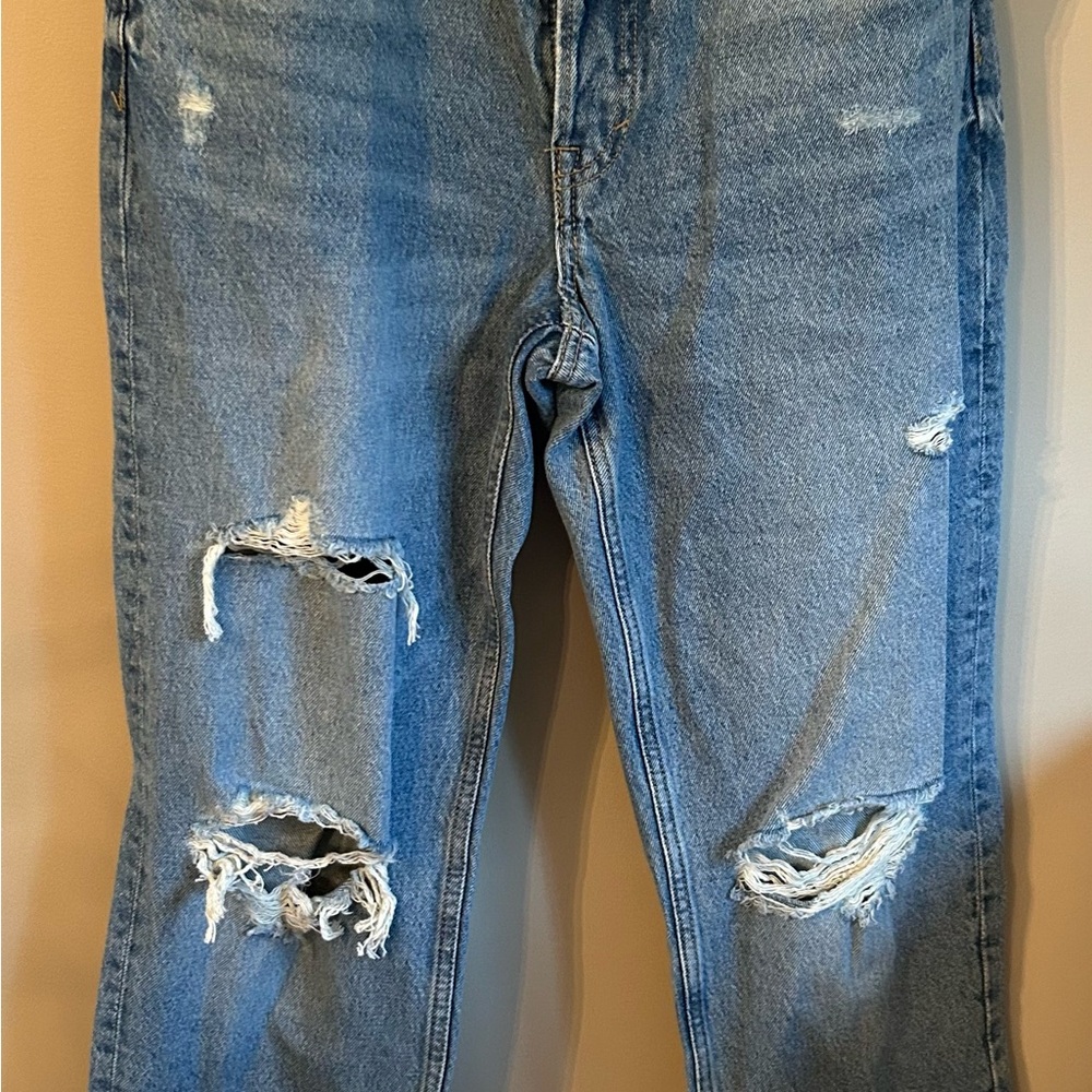 Distressed Blue Jeans
